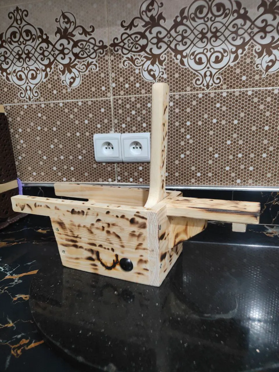 هراسة الزيتون الخشبية