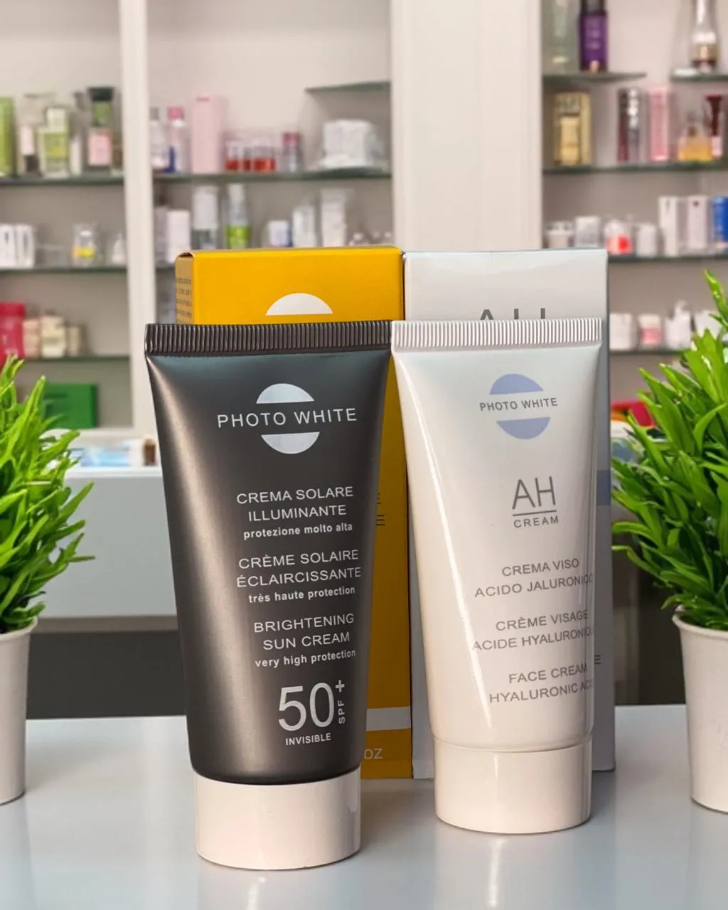 Photo White Crème Solaire Éclaircissante SPF50+ – 50ml - Photo White AH Crème Visage à l'Acide Hyaluronique – 50ml